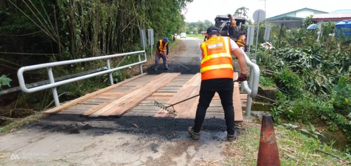 Repairs being done to the bridge and road today.