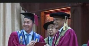 KDM Kiulu candidate Henry Saimpon takes a “break” from campaigning to receive his Master’s Degree at UTM Johor