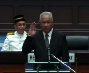 Datuk Rusdin Riman Sole representative of the KDM party Datuk Rusdin takes his oath as the ...