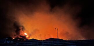 200 houses on water destroyed in a fire