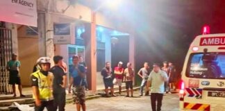A local man dies after falling from a building