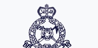 Police on the lookout for a suspect involved in a murder case in Penampang