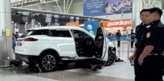 A woman accidentally pressed the pedal, causing a Proton X70 to crash into the KKIA departure hall