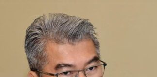 LEBUH RAYA PAN BORNEO 10 TAHUN, HANYA 4 PAKEJ SIAP — YB CALVIN CHONG DESAK KERAJAAN NEGERI JELASKAN KELEWATAN DAN PENINGKATAN KOS